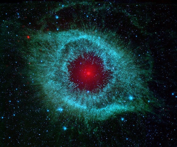 Comets_Kick_up_Dust_in_Helix_Nebula_(PIA09178)